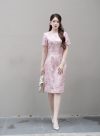 Đầm gấm hồng chiết eo
